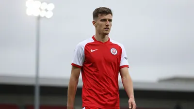 Lincoln City's Adam Jackson Future Uncertain Amid Transfer Window