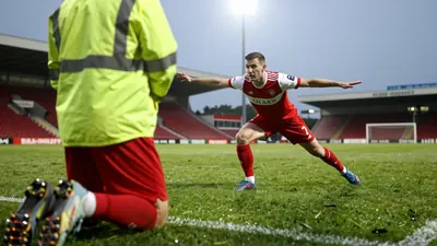 Lincoln City have condemned a supporter who invaded the pitch during their home loss to Swansea City, warning that...